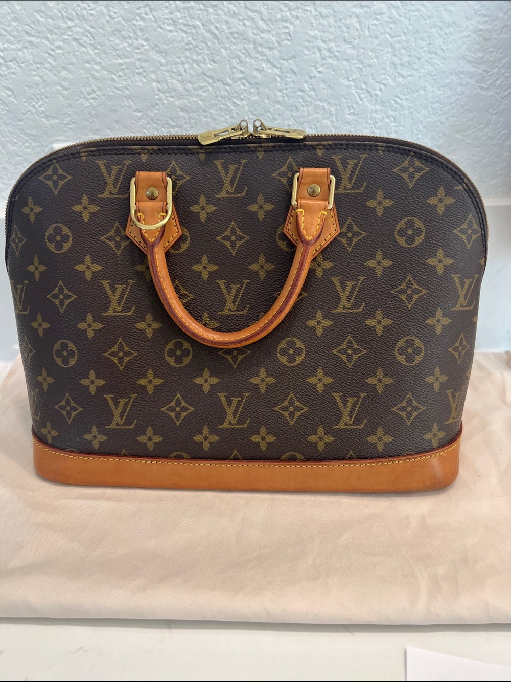 Louis Vuitton Monogram Alma Top-Handle Satchel in Brown and Vachetta